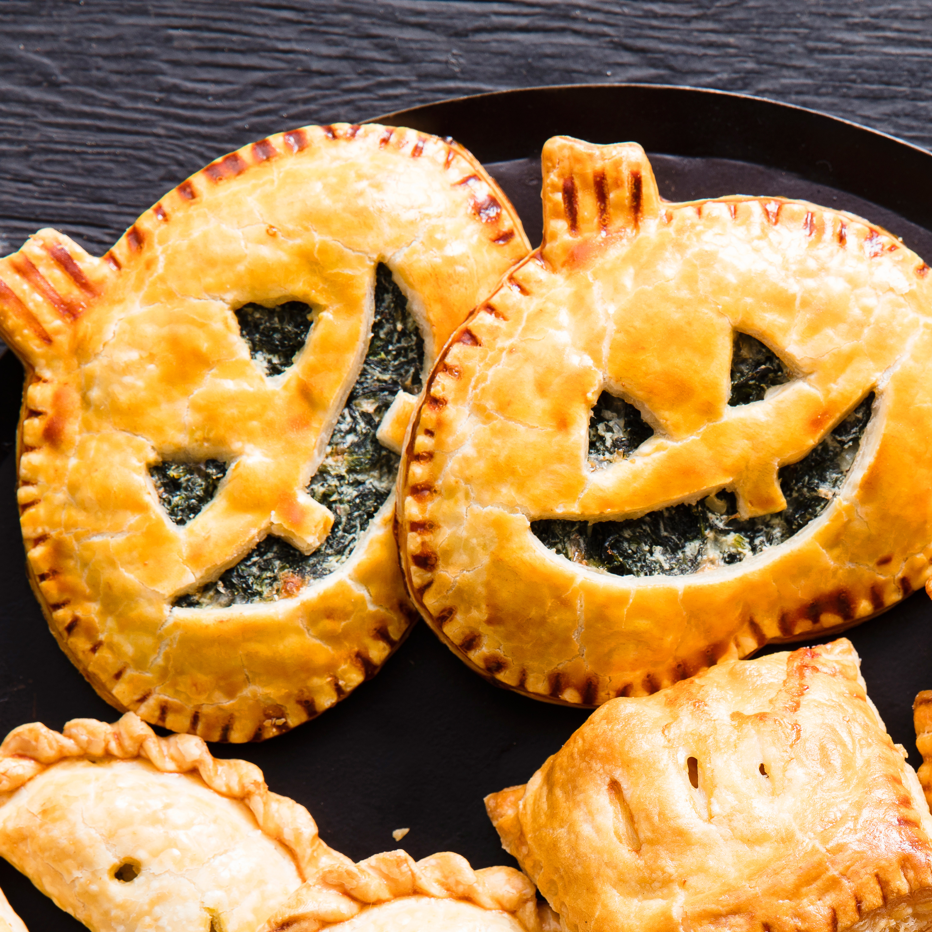 How to Make Spinach Jack-O'-Lantern Hand Pies