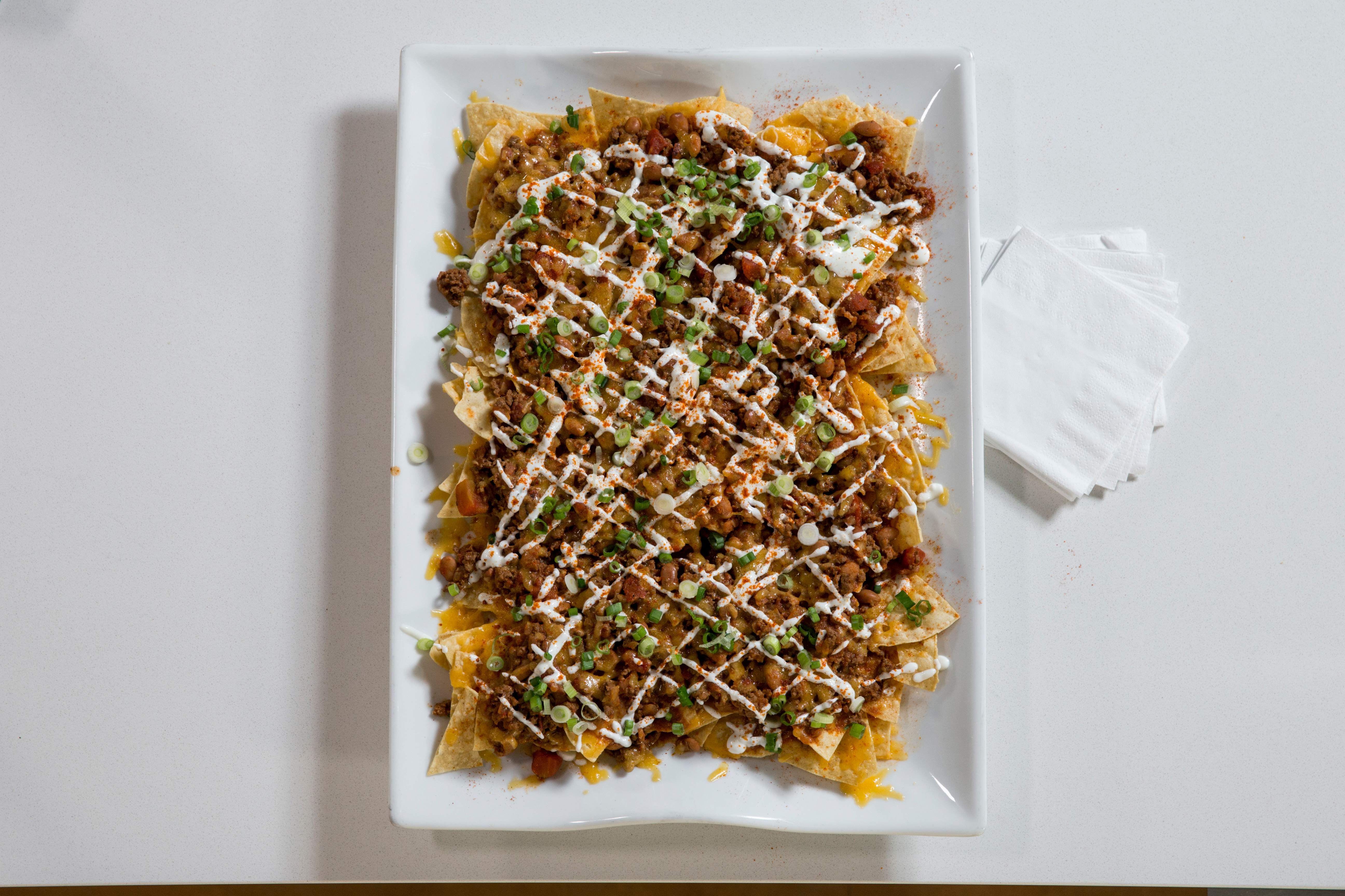 How to Make Smoky Beef-and-Bacon Chili Nachos