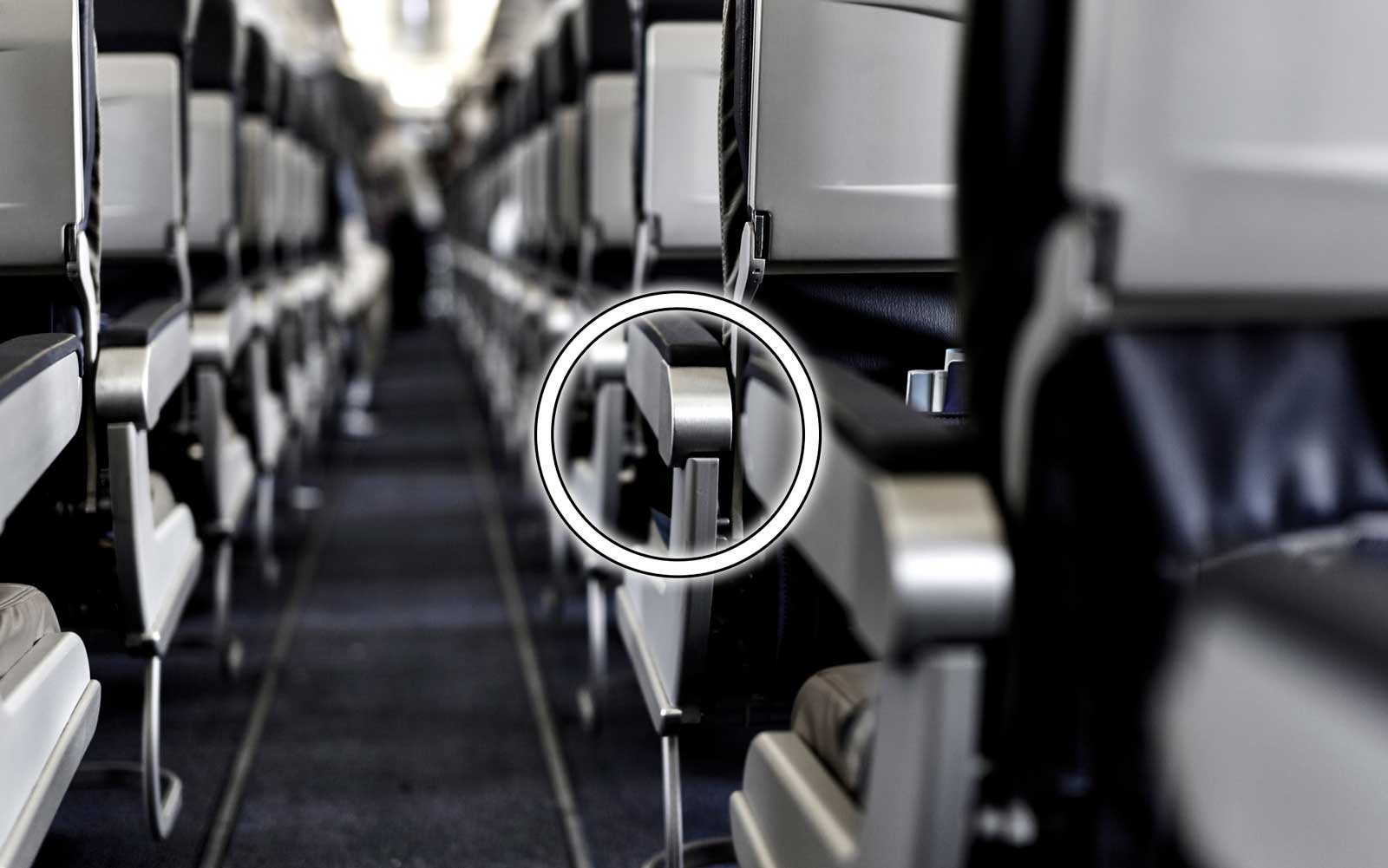 There's a Secret Button on Your Airplane Seat That Will Instantly Give You More Room