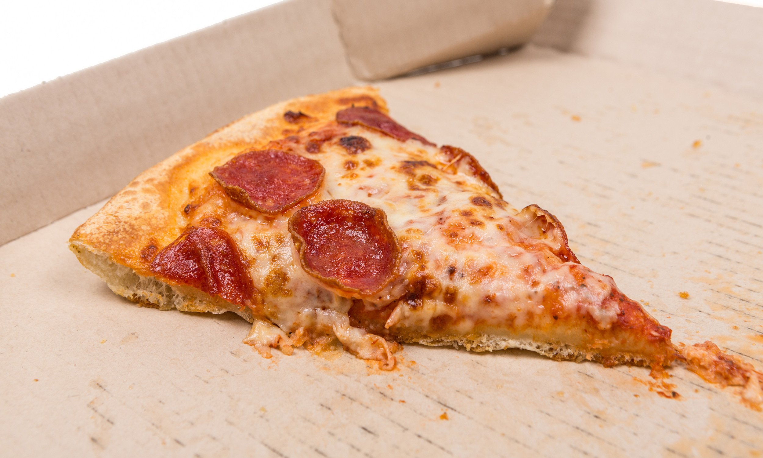 How to Reheat Cold Pizza Like a Functional Adult