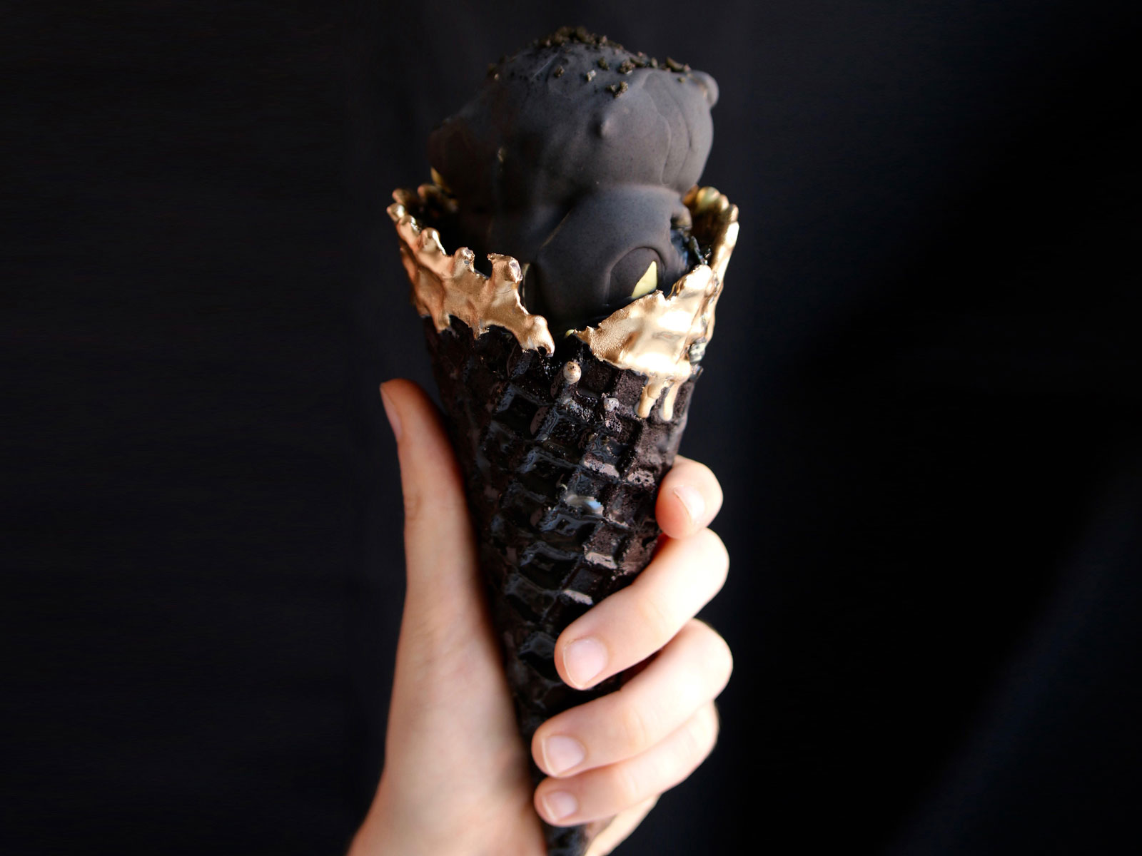 This Blacked Out Ice Cream Cone Is a Great, Geeky Accompaniment to the Eclipse