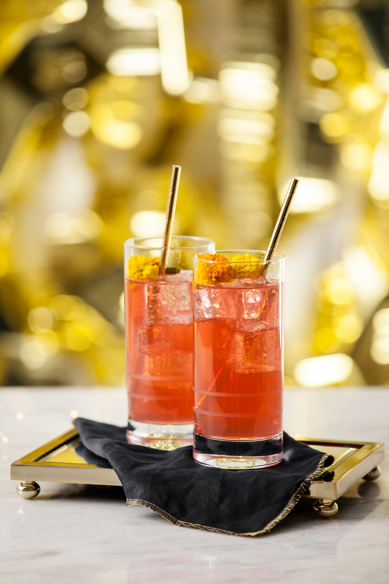 Drink Like a Star While You Watch the Golden Globes with This Glittery Cocktail