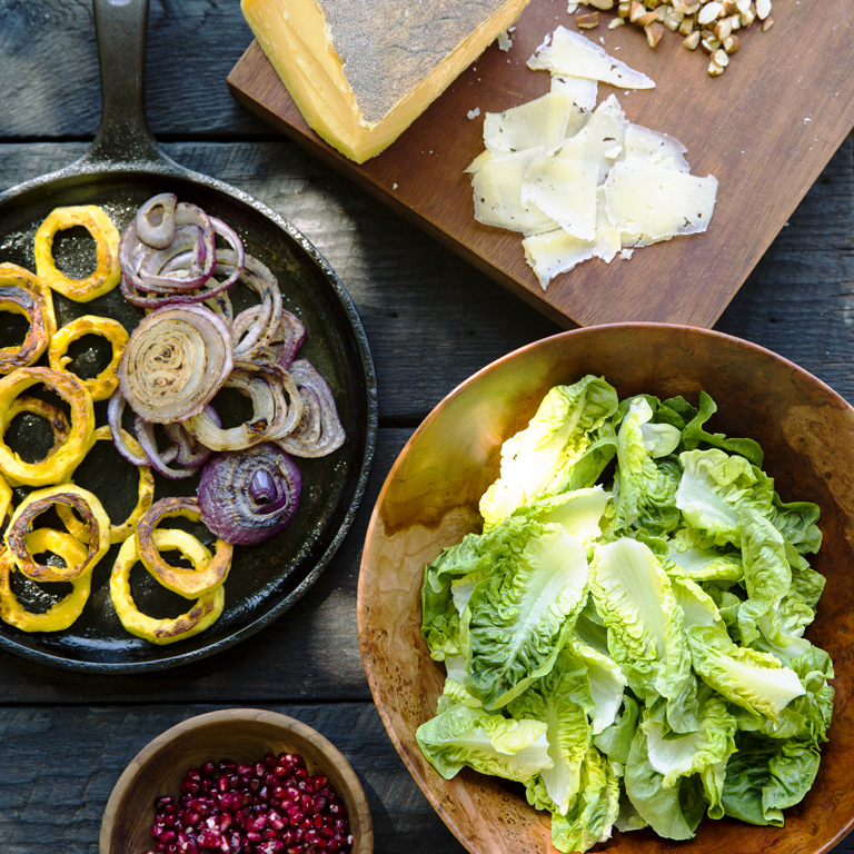 su-Green Salad with Almonds, Charred Onion, and Pomegranates Image