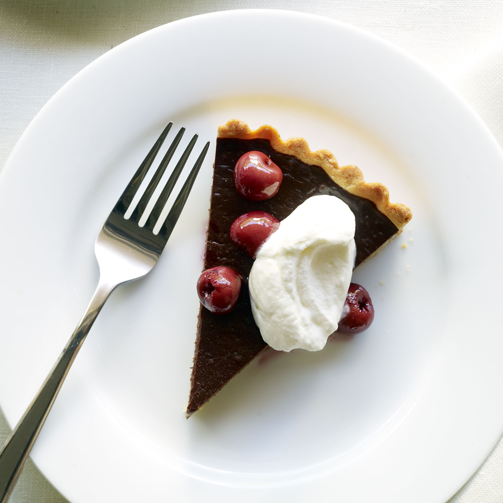 dark-chocolate-tart-with-cherries-and-almond-whipped-cream