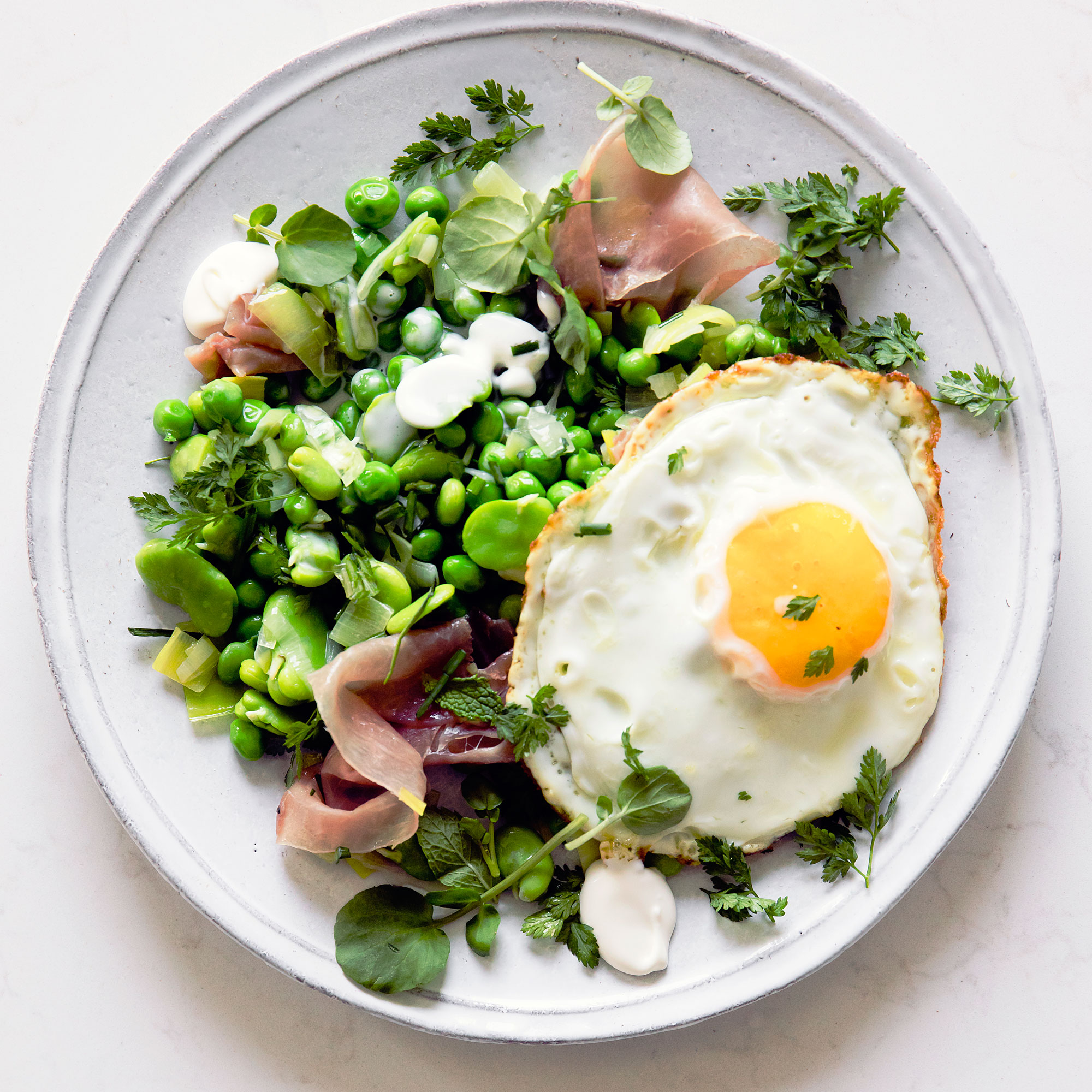 favas-and-peas-with-serrano-and-fried-eggs-menestra