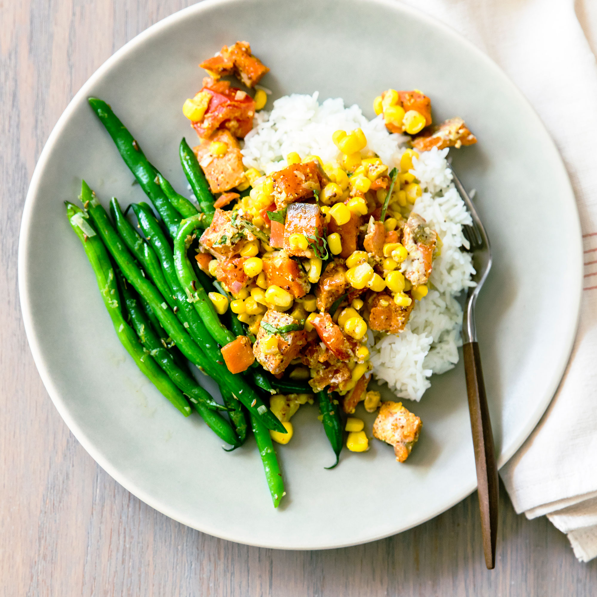 slow-roasted-curried-salmon-with-corn-and-tomato