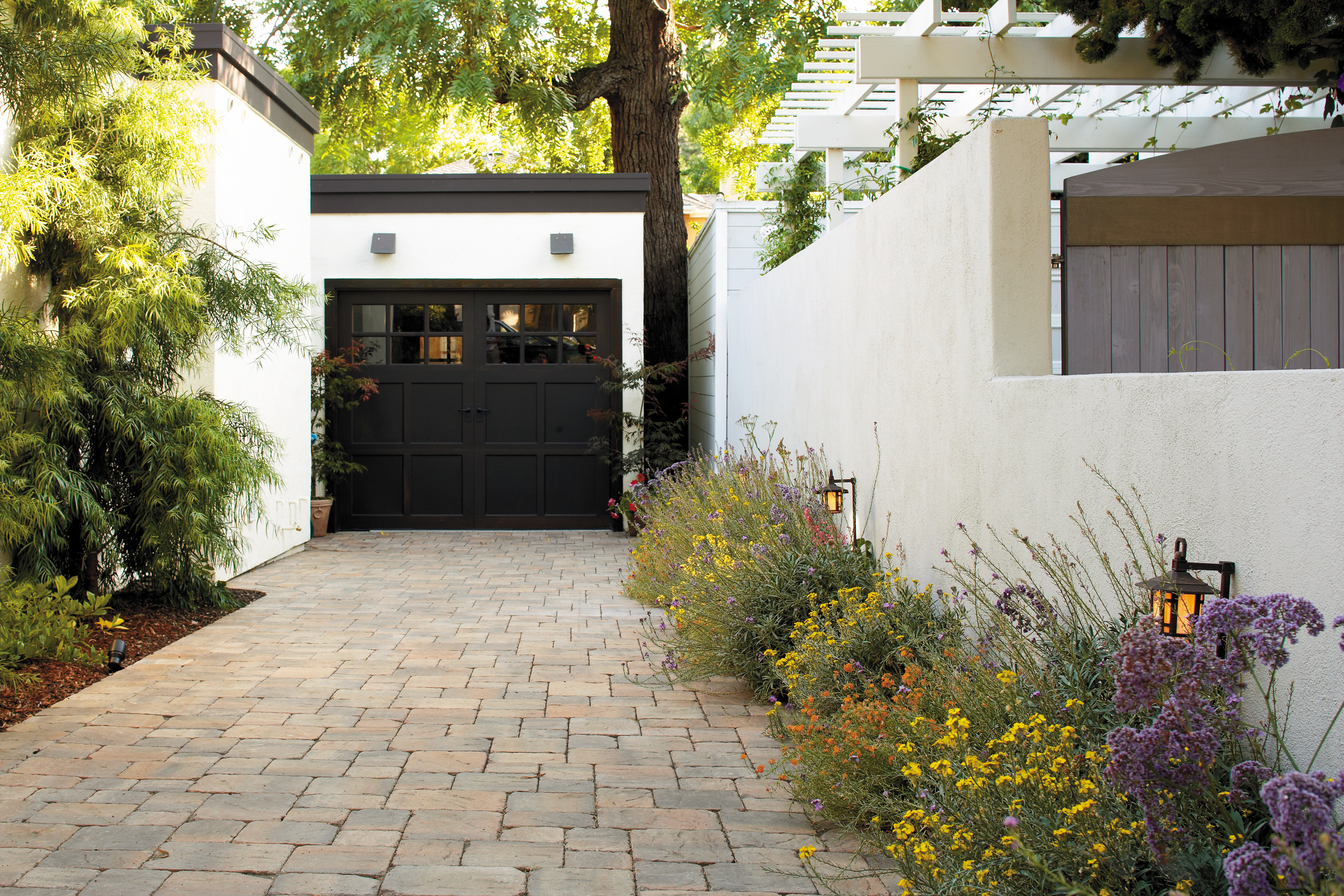 concrete-pavers-line-a-driveway