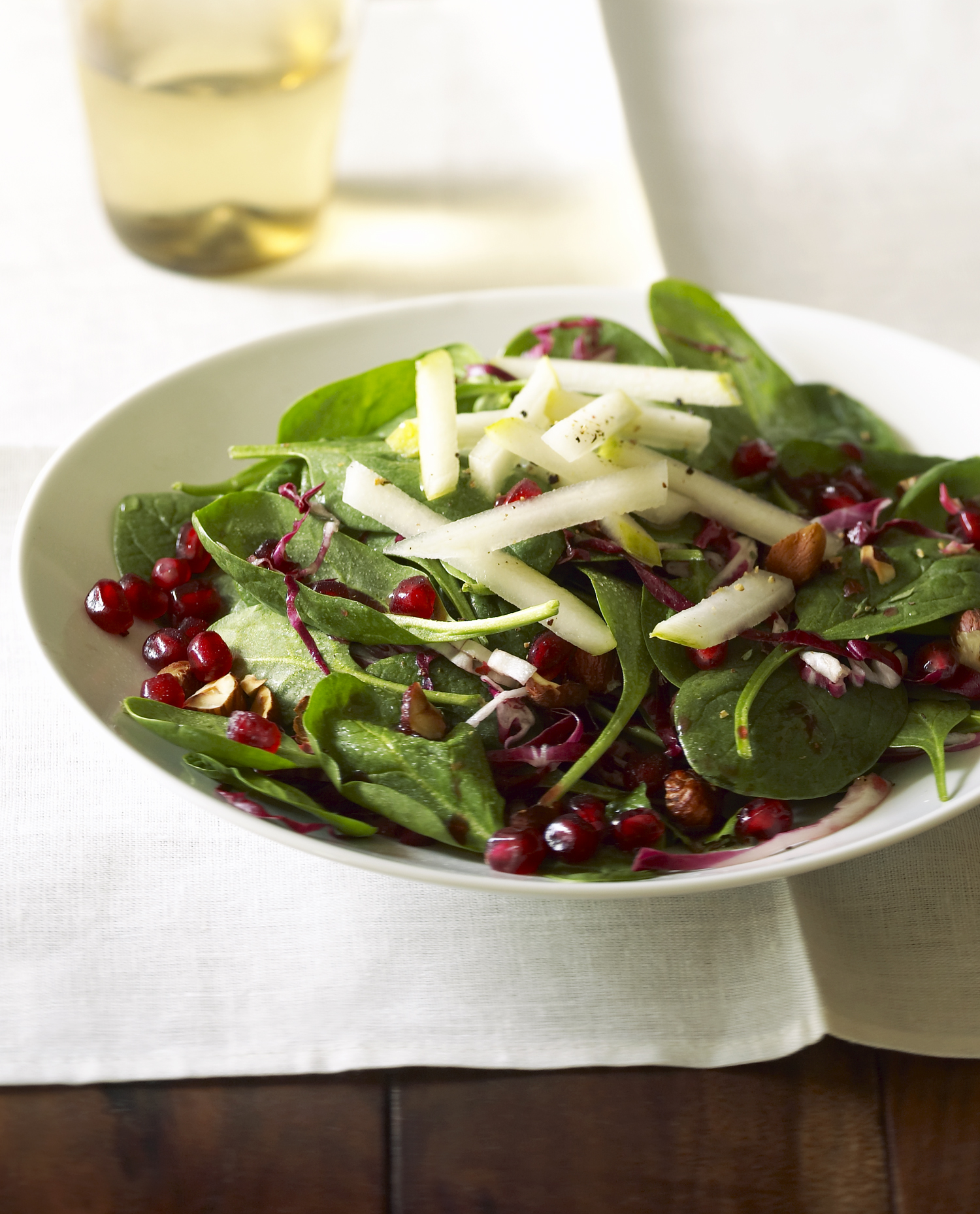 Spinach Pomegranate Salad with Pears and Hazelnuts
