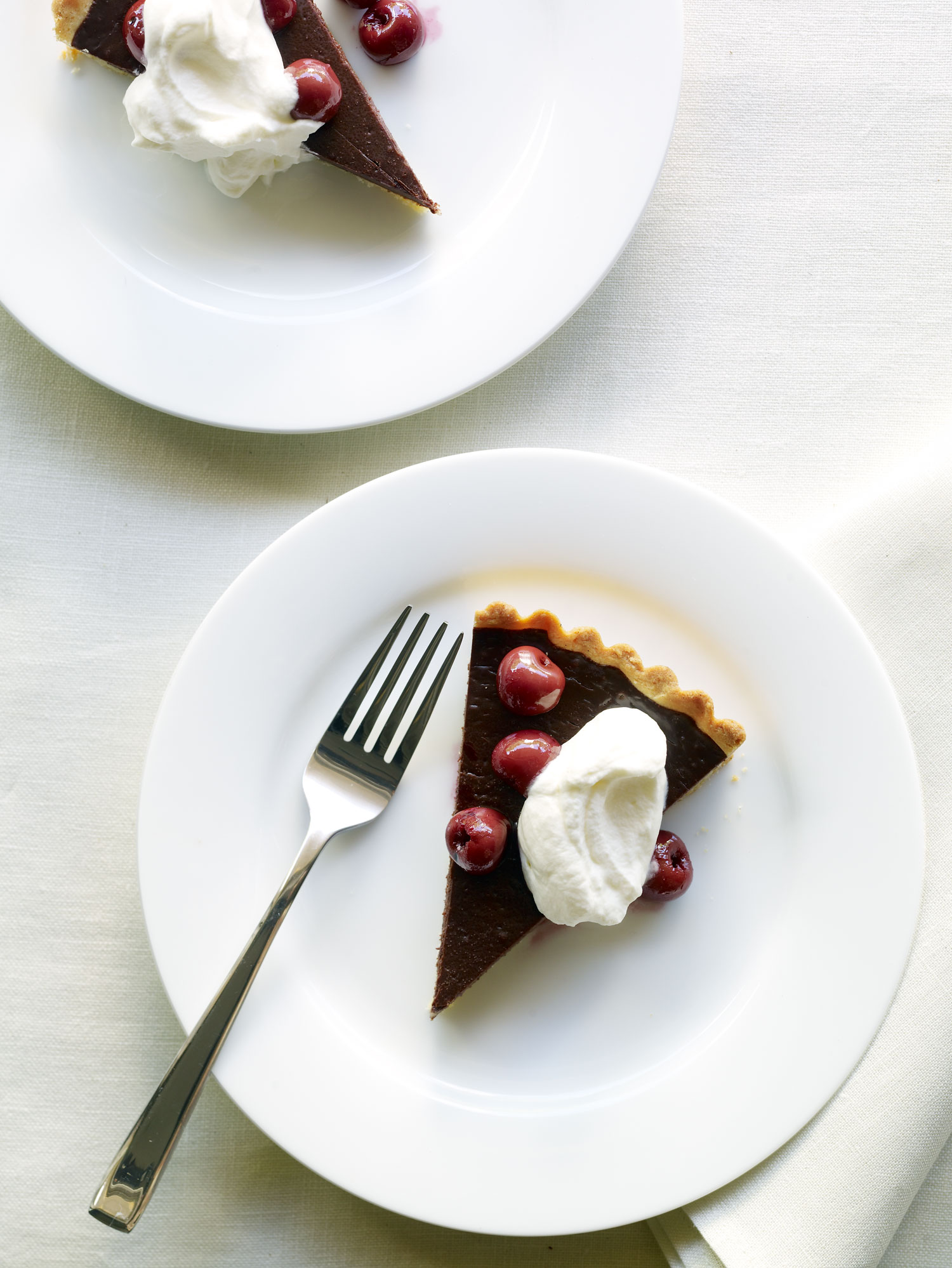 dark-chocolate-tart-with-cherries-and-almond-whipped-cream