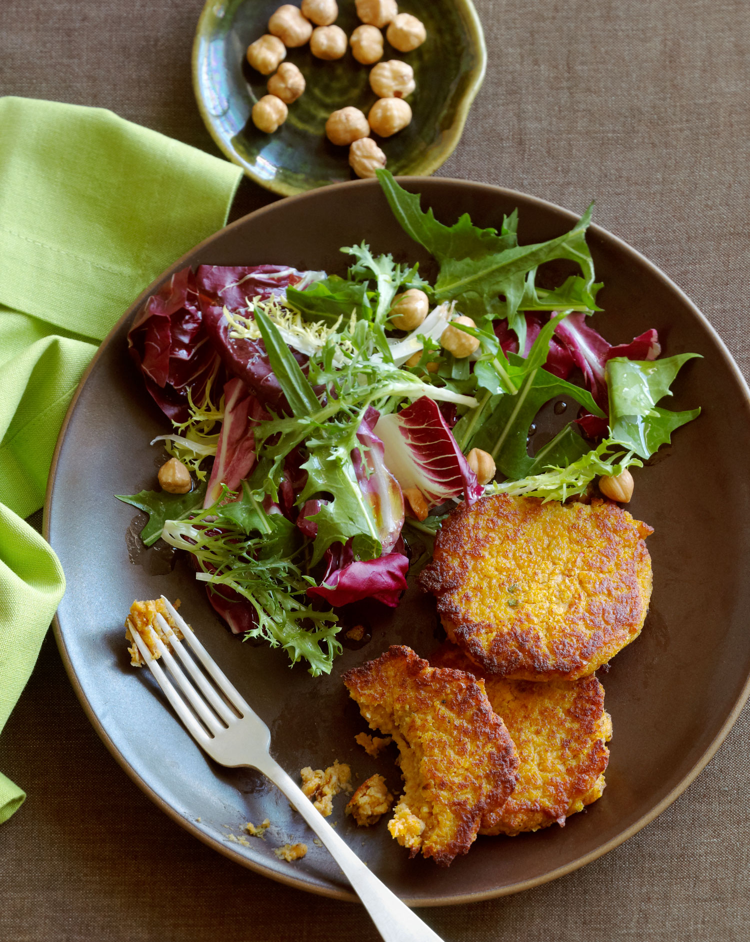 squash-and-chickpea-fritters-with-winter-greens-and-hazelnut-salad