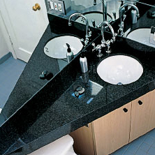 triangular-counter-uses-space-over-toilet