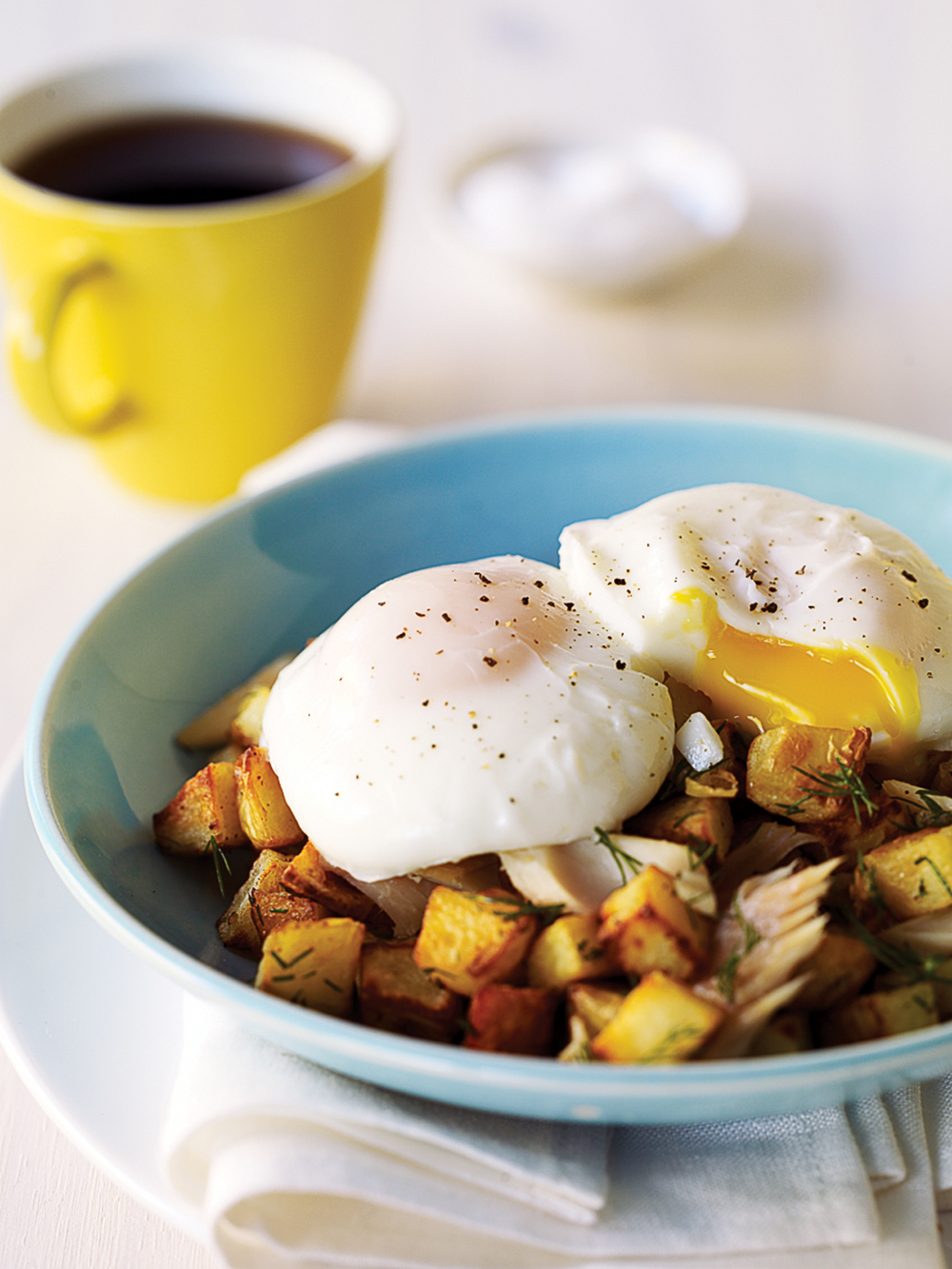 Poached: Poached Eggs With Smoked Trout and Potato Hash (0415)