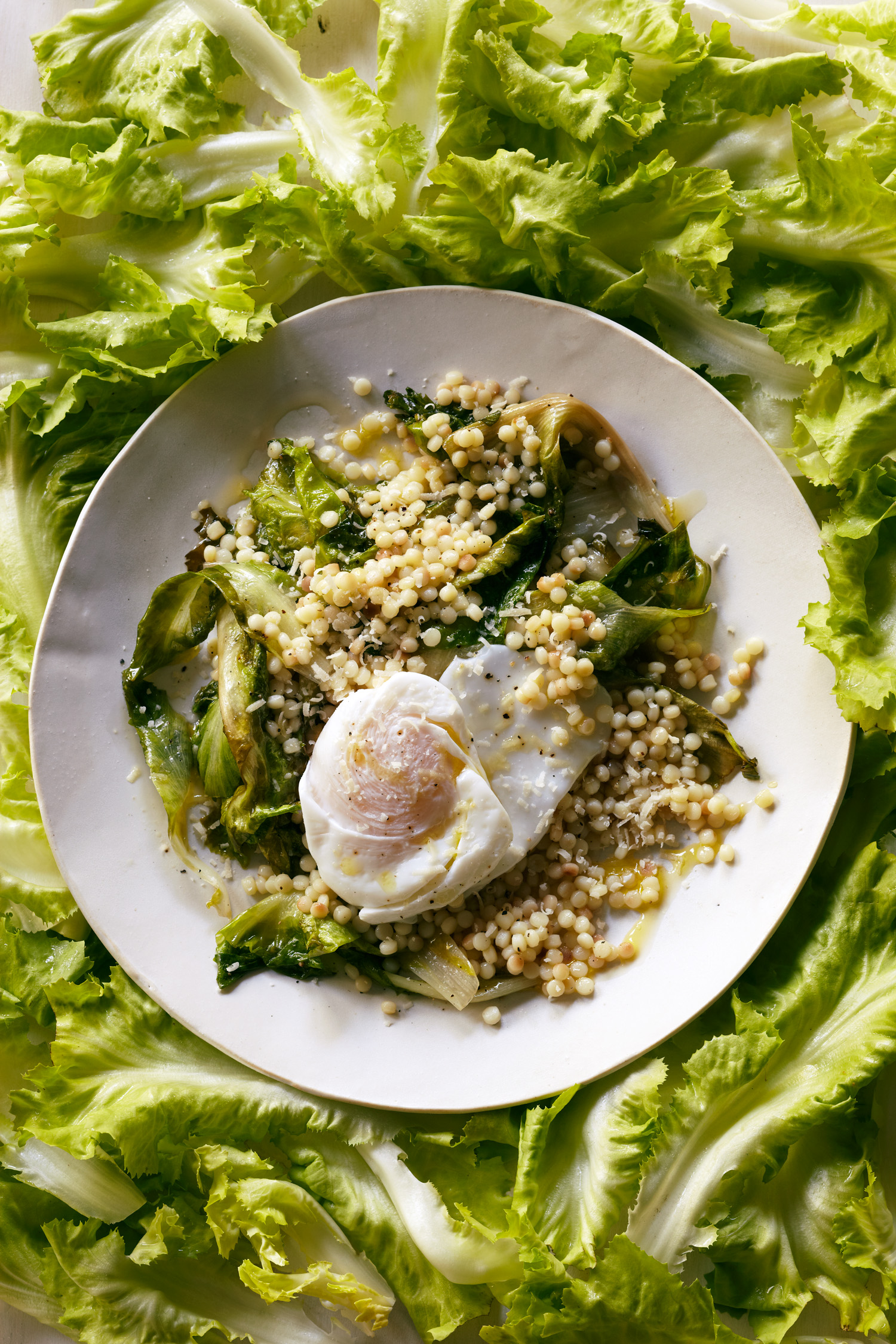 sauteed-escarole-with-toasted-pearl-couscous-and-poached-eggs