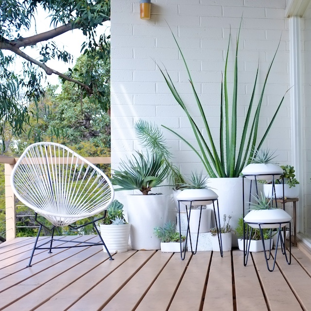We'll Never Get Tired of an Acapulco Chair on the Patio