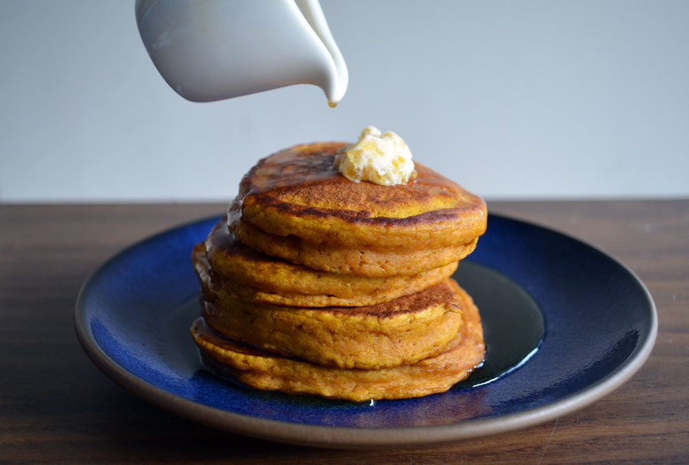 Fluffy pumpkin pancakes with ginger butter