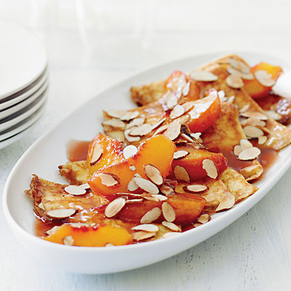 Crêpes with Warm Cognac Peaches and Almonds Crêpes with Warm Cognac Peaches and Almonds