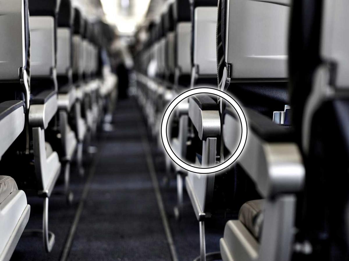 There's a Secret Button on Your Airplane Seat That Will Instantly Give You More Room