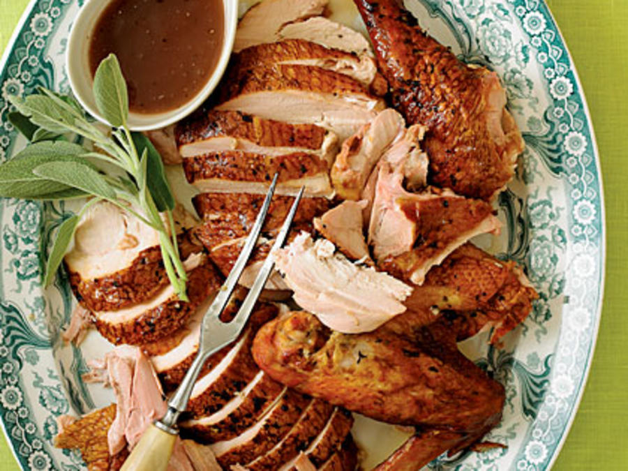 https://img.sunset02.com/sites/default/files/styles/4_3_horizontal_-_900x675/public/image/recipes/su/08/11/smoked-turkey-su-1853906-x.jpg