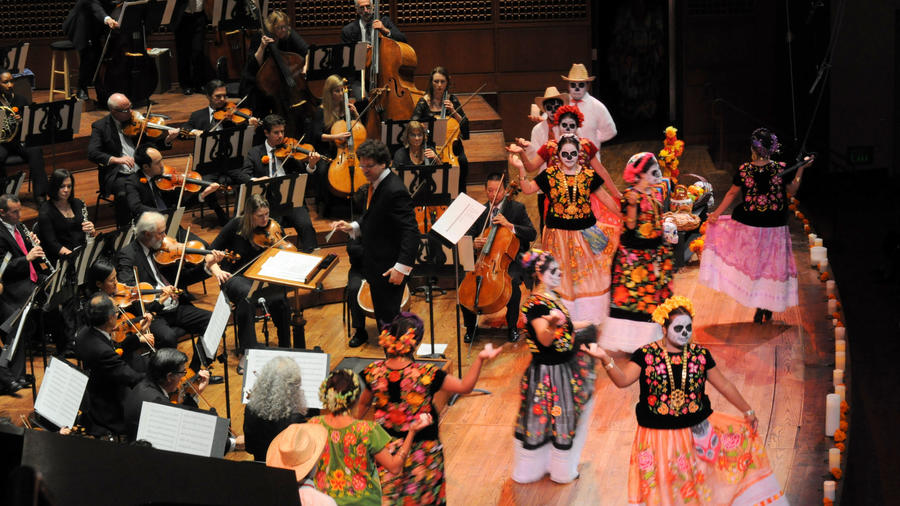 Performers on stage with the Davies Symphony in San Francisco at a Day of the Day Event