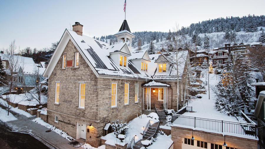 The Washington School House winter lodge in Park City covered in snow