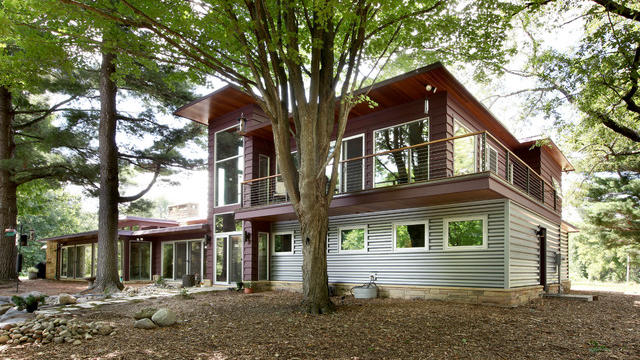 This dreamy forest home even has its own train