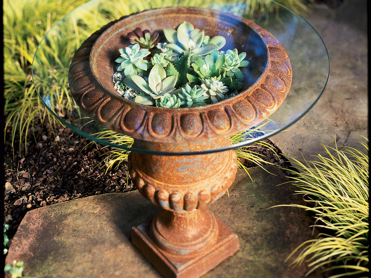 Urn as patio table – or container for a living bouquet