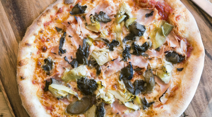 Capricciosa Pizza (Ham, Mushrooms, Mozzarella, and Artichokes)