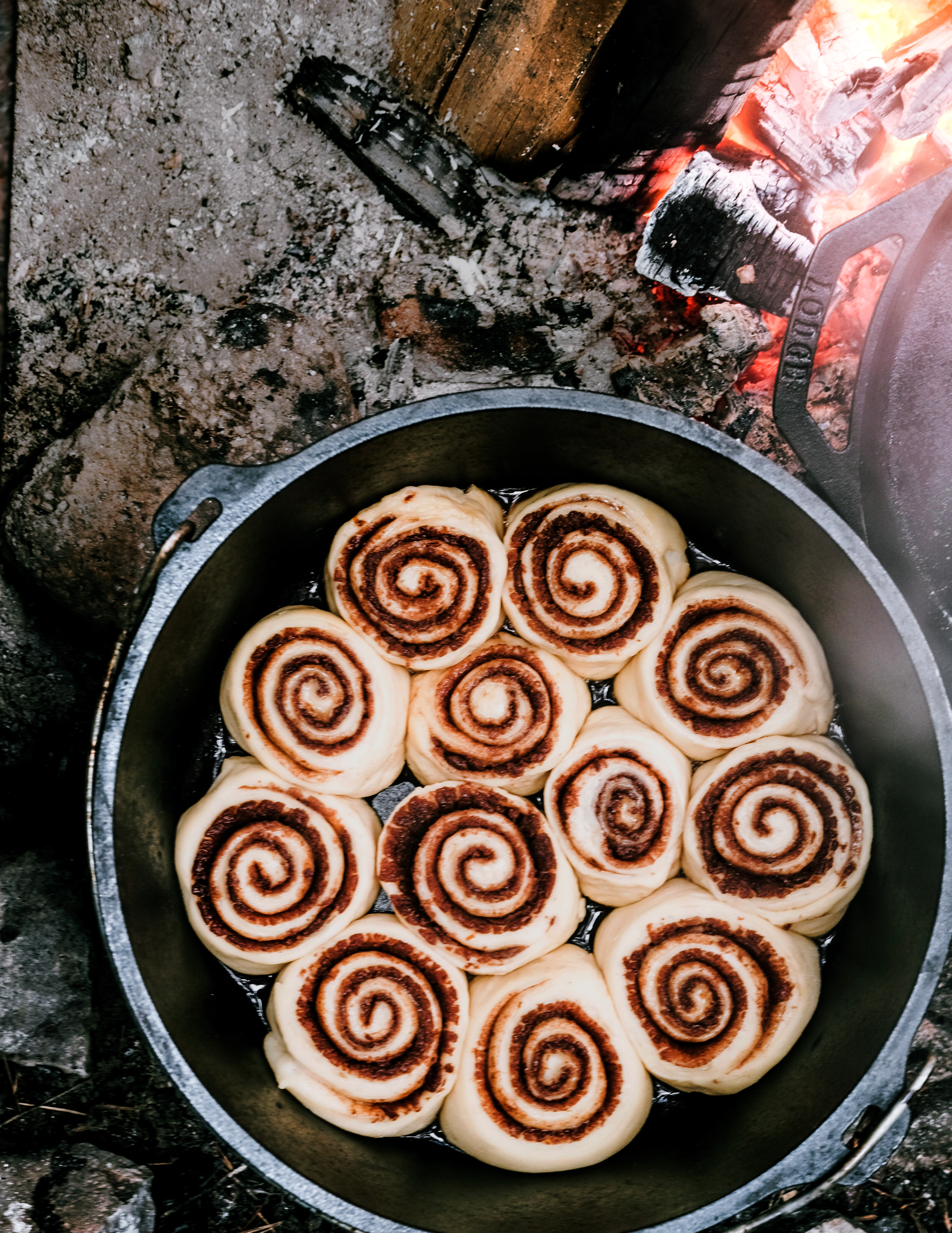 Dutch Oven Cinnamon Rolls with Orange Almond Icing